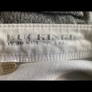 Burberry cropped white jeans.